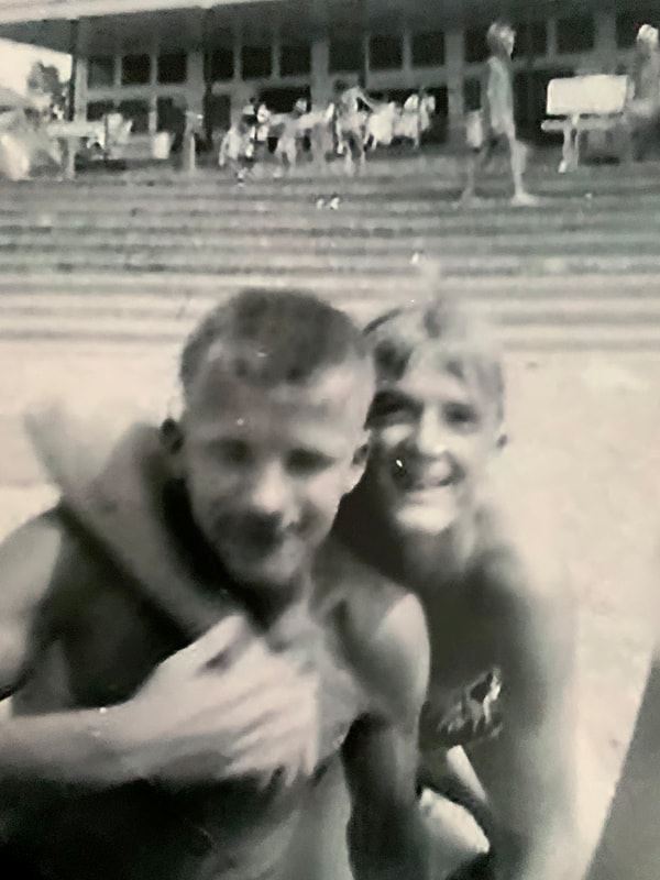 Black and white photo of youth on the beach