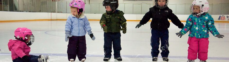 Young Children Learning to Skate