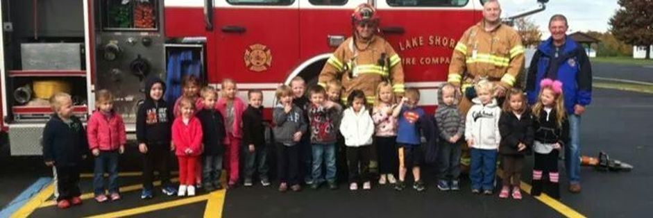 Kids with Firefighters and Fire Truck